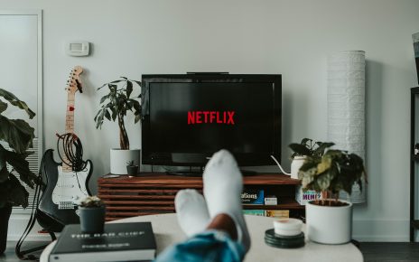 black flat screen tv turned on displaying 11